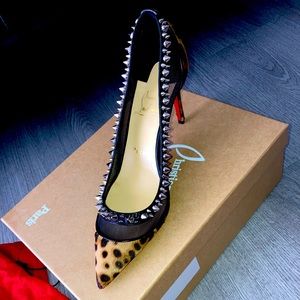 7.5 red bottoms worn once leopard pumps with spikes paid $995.00 asking $500